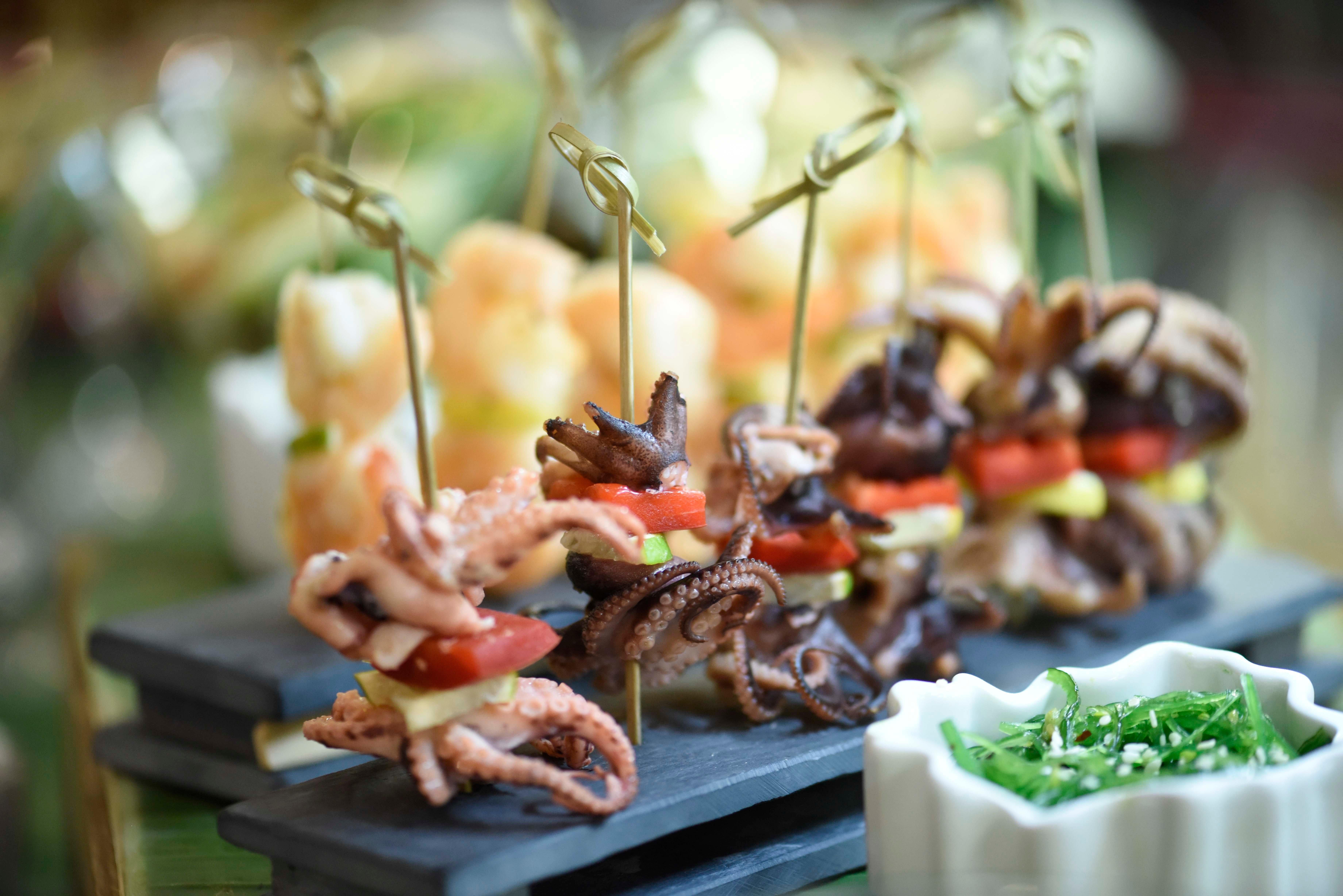 Grand Hotel 부쿠레슈티 외부 사진 Octopus and shiitake mushroom skewers